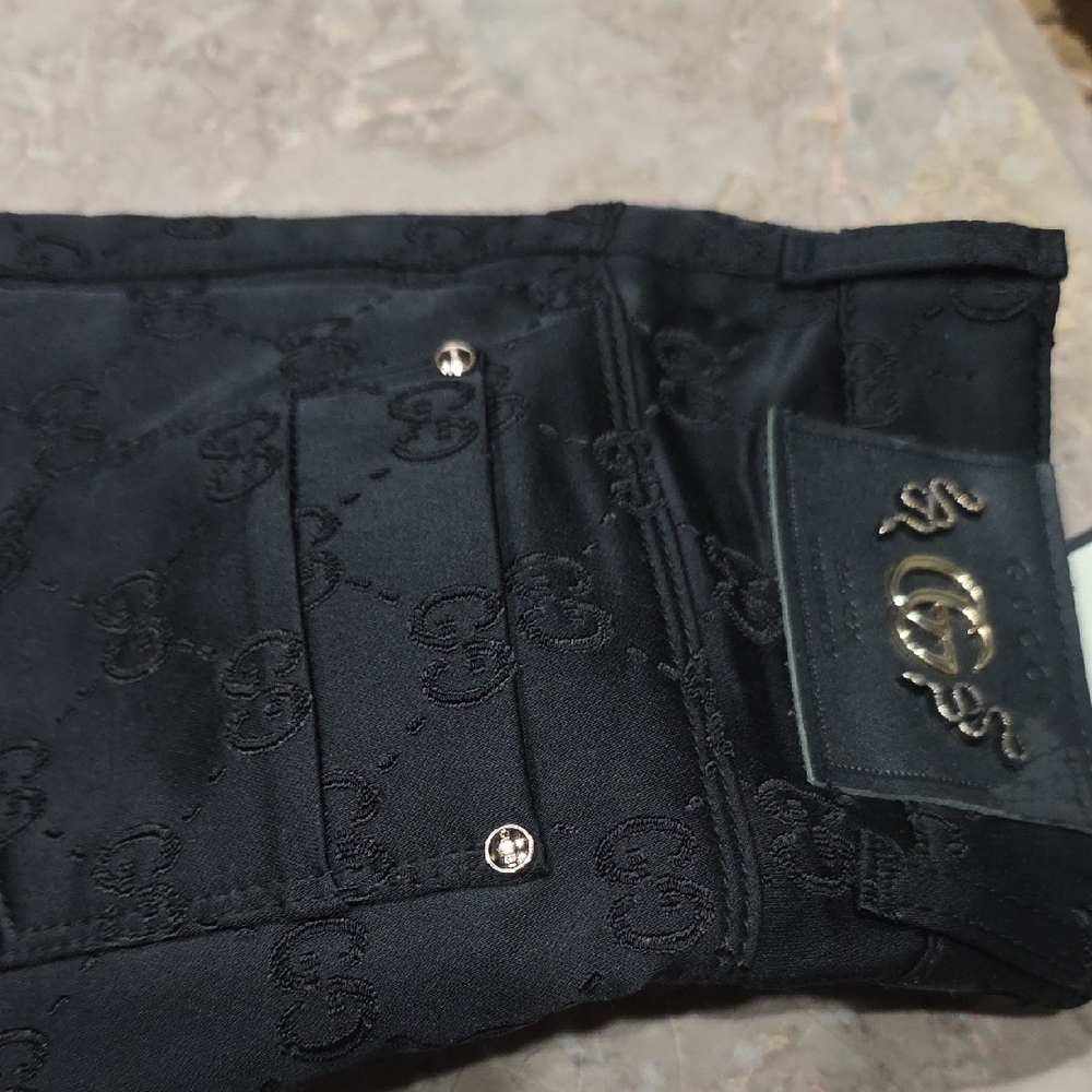Gucci Black Monogram Trousers with Gold Detail